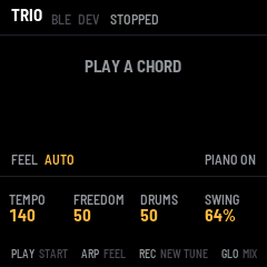 TRIO at rest: TRIO, BLE DEV and STOPPED in the header, PLAY A CHORD in the middle, FEEL AUTO, PIANO ON, the knobs TEMPO 140, FREEDOM 50, DRUMS 50, SWING 64%